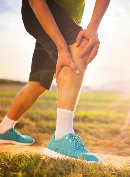 Man Pulling A Muscle in Pain While Hiking Personal Injury